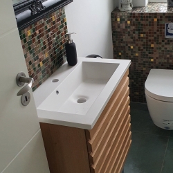 murer renovering af badeværelse fliser håndvask