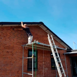 omfugning af murværk hus tag