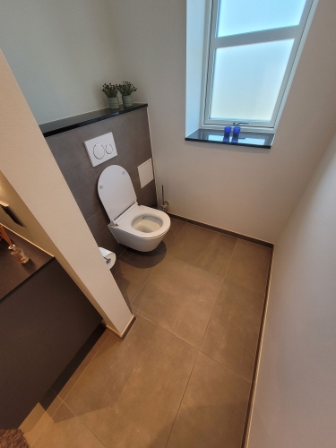 murer nyt badeværelse fliser toilet