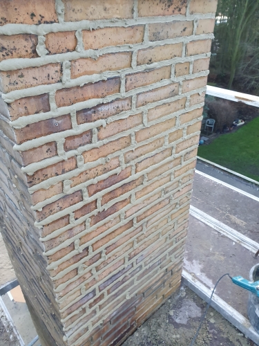 omfugning af murværk og udkradsning